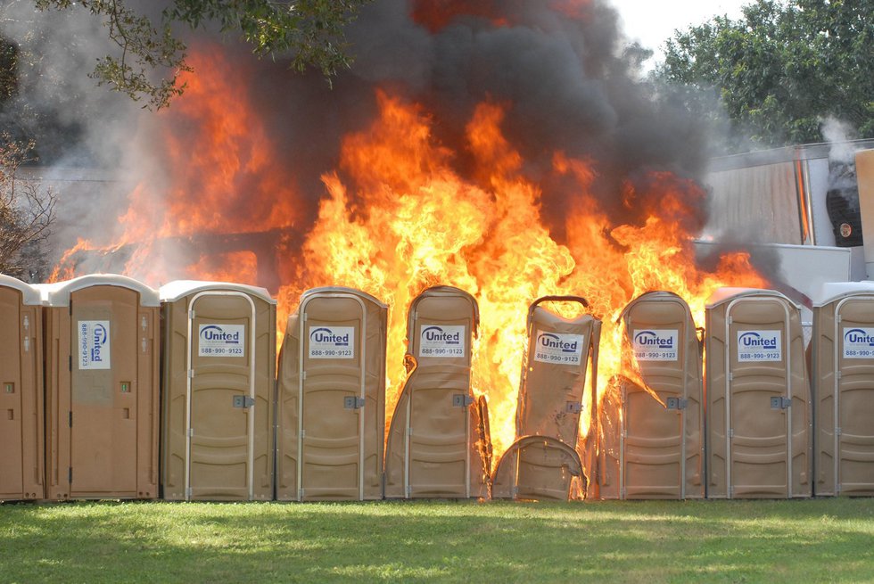 Cover-1-Burning-porta-potties.jpg